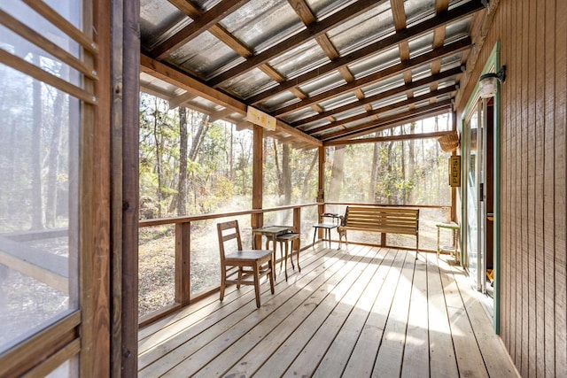 unfurnished sunroom featuring a healthy amount of sunlight