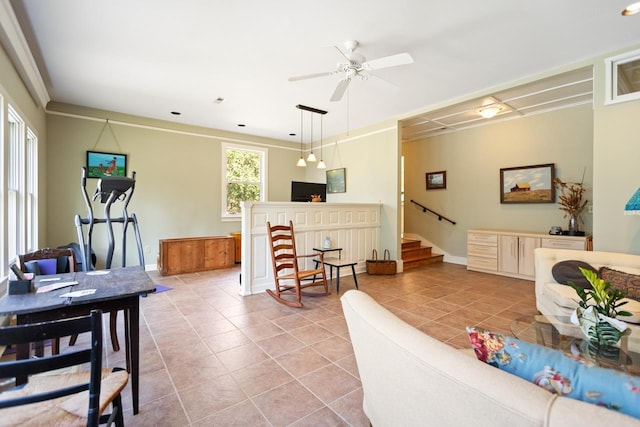 tiled living room featuring ceiling fan