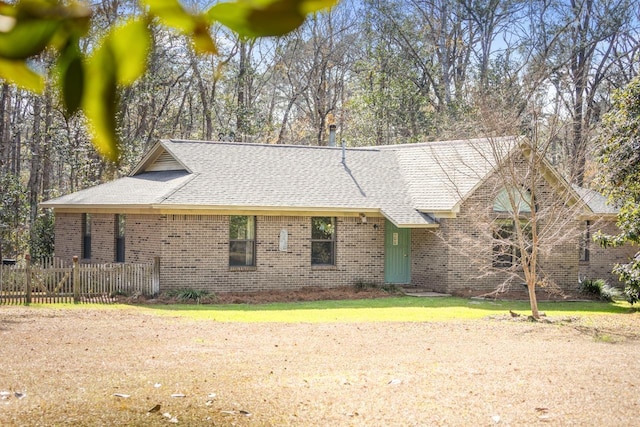 view of front of home with a front yard