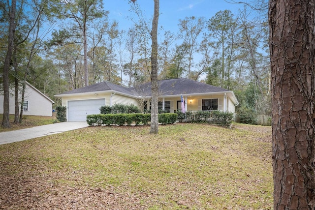 single story home featuring a garage and a front yard