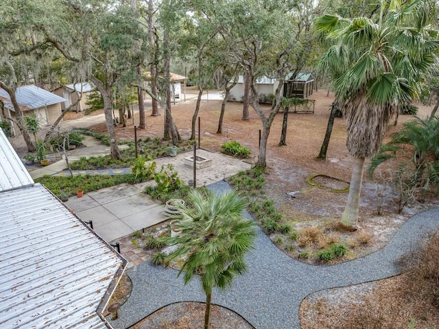 view of home's community featuring a patio area