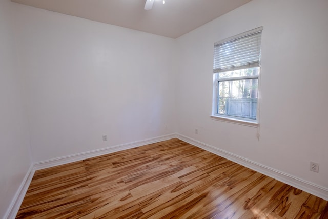 unfurnished room with light hardwood / wood-style floors