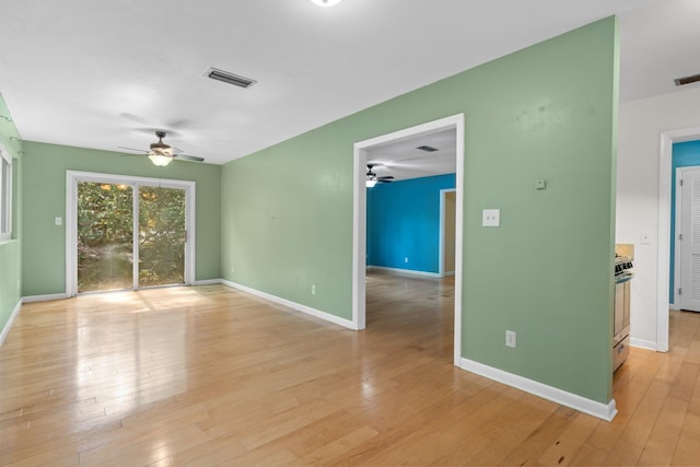 1233 Talbot Ave, Tallahassee, FL 32308 - empty room featuring ceiling fan, light wood finished floors, and baseboards