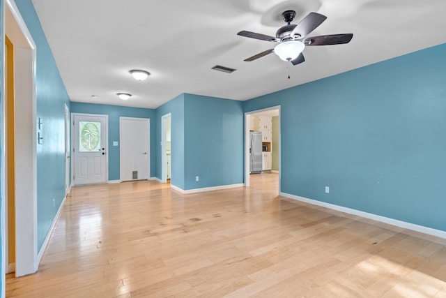 1233 Talbot Ave, Tallahassee, FL 32308 - unfurnished room featuring a ceiling fan, baseboards, and light wood-type flooring
