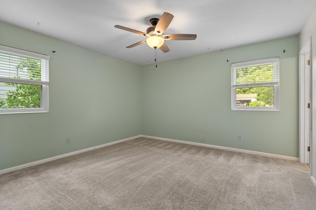 1233 Talbot Ave, Tallahassee, FL 32308 - carpeted spare room featuring ceiling fan and baseboards