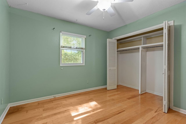 1233 Talbot Ave, Tallahassee, FL 32308 - unfurnished bedroom with light wood-style floors, baseboards, a closet, and a ceiling fan