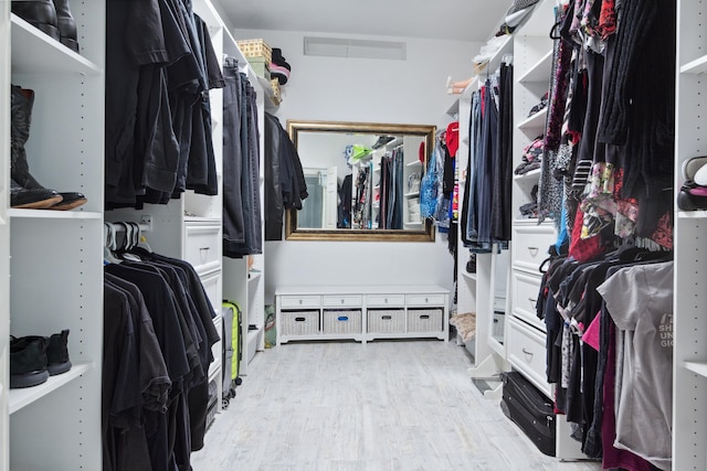 spacious closet with light wood-type flooring