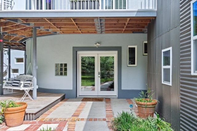 doorway to property featuring french doors