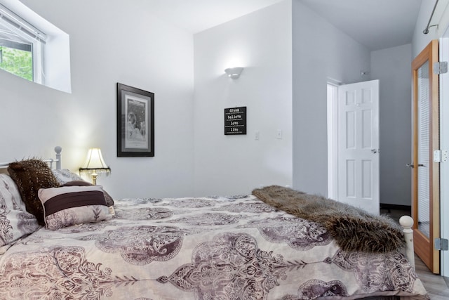 bedroom with hardwood / wood-style floors