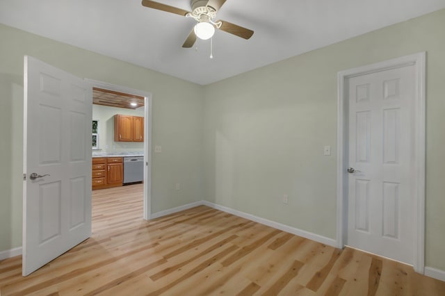 unfurnished bedroom with light hardwood / wood-style flooring and ceiling fan