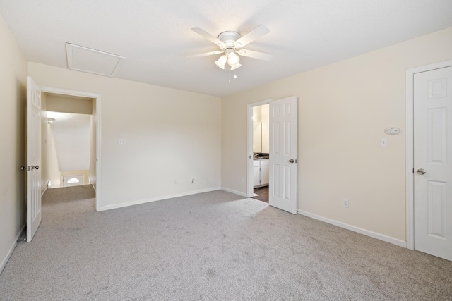 3068 Royal Palm Way, Tallahassee, FL 32309 - unfurnished bedroom featuring carpet flooring, attic access, baseboards, and ceiling fan