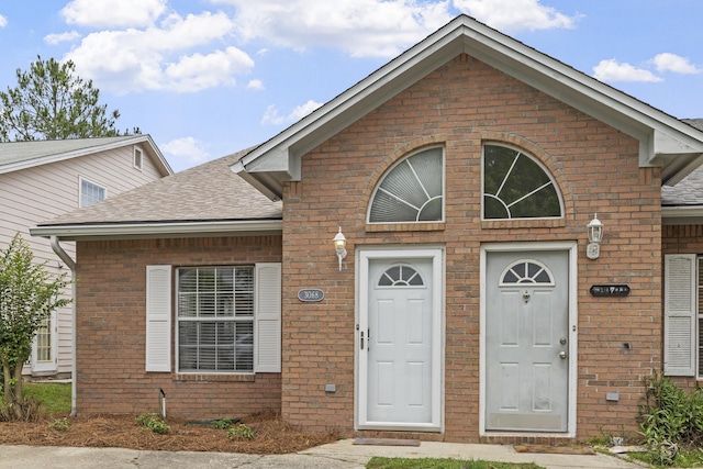 3068 Royal Palm Way, Tallahassee, FL 32309 - view of front of home with brick siding and roof with shingles