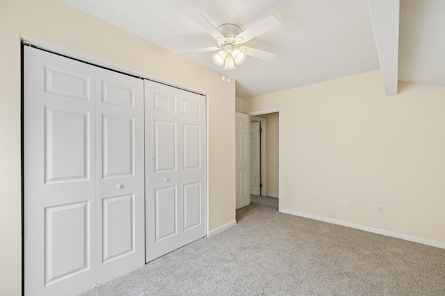 3068 Royal Palm Way, Tallahassee, FL 32309 - unfurnished bedroom with light colored carpet, a closet, baseboards, a textured ceiling, and ceiling fan