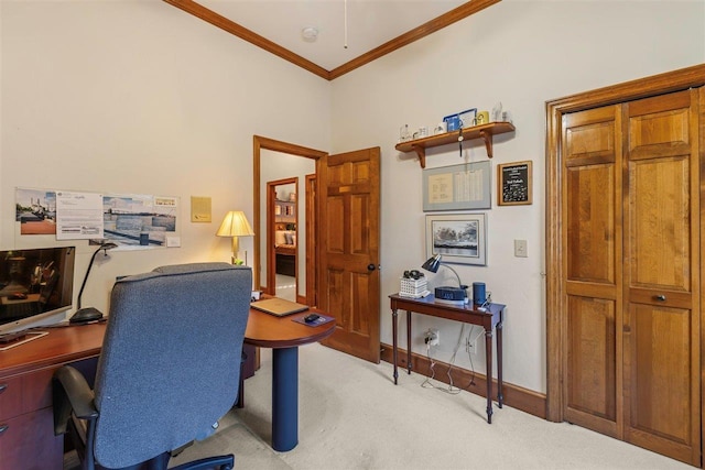 carpeted home office featuring ornamental molding