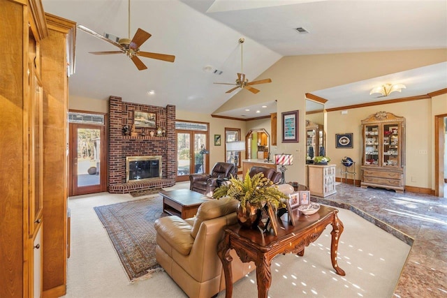 living room with ceiling fan, a fireplace, and high vaulted ceiling