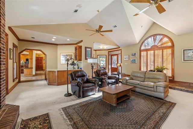 carpeted living room featuring high vaulted ceiling and ceiling fan