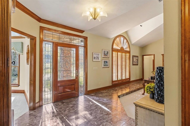 foyer with lofted ceiling and a chandelier