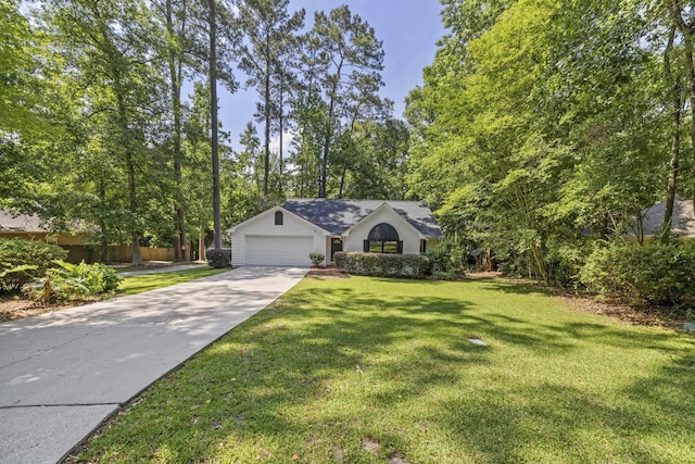 8352 Chickasaw Trl, Tallahassee, FL 32312 - ranch-style house with driveway and a garage