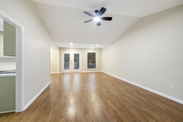 8352 Chickasaw Trl, Tallahassee, FL 32312 - unfurnished living room with ceiling fan, wood finished floors, baseboards, vaulted ceiling, and recessed lighting