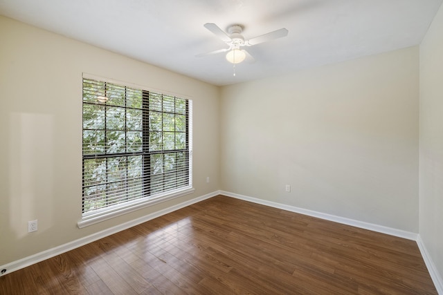 8352 Chickasaw Trl, Tallahassee, FL 32312 - unfurnished room featuring baseboards, dark wood-style flooring, and ceiling fan