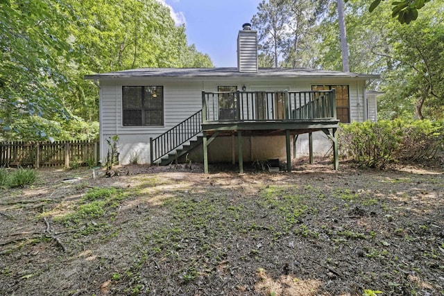 8352 Chickasaw Trl, Tallahassee, FL 32312 - back of house with a deck, stairs, and a chimney