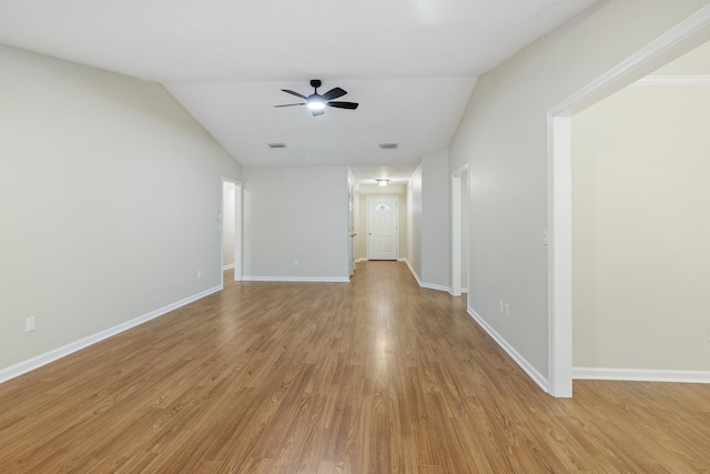 8352 Chickasaw Trl, Tallahassee, FL 32312 - empty room featuring light wood finished floors, ceiling fan, baseboards, and lofted ceiling