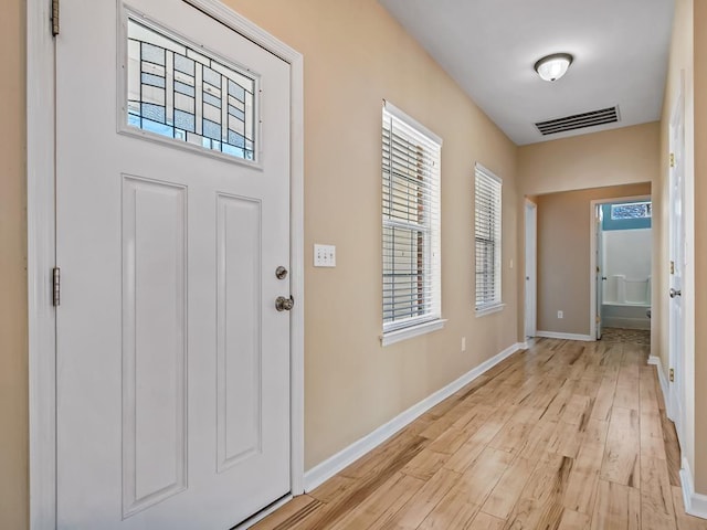 entrance foyer featuring light wood-type flooring