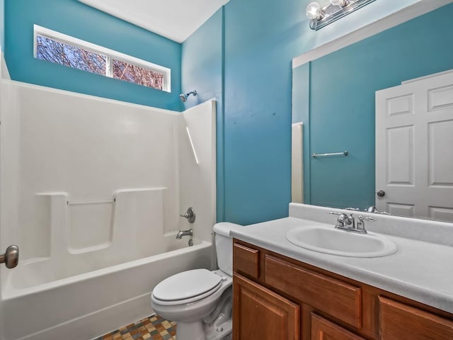 full bathroom with toilet, vanity, and  shower combination