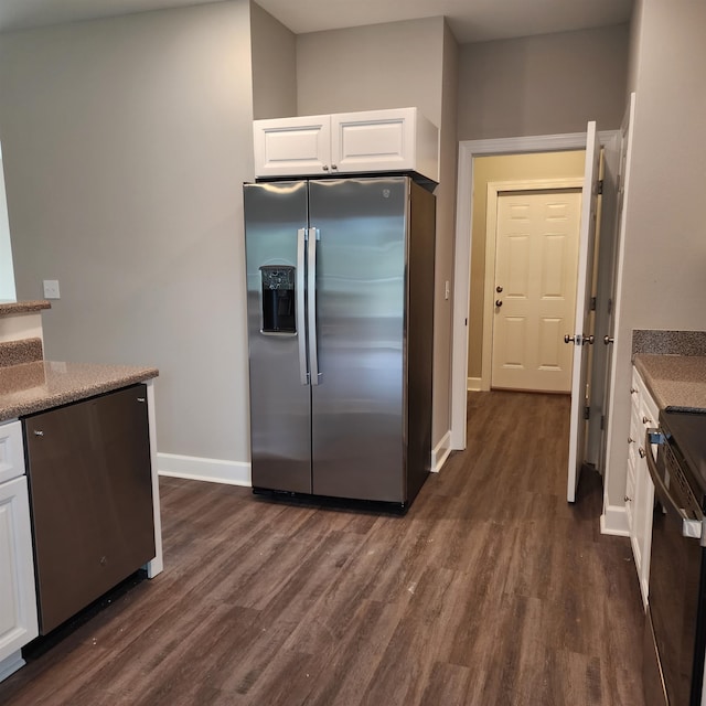 kitchen featuring dark hardwood / wood-style floors, white cabinetry, and stainless steel appliances