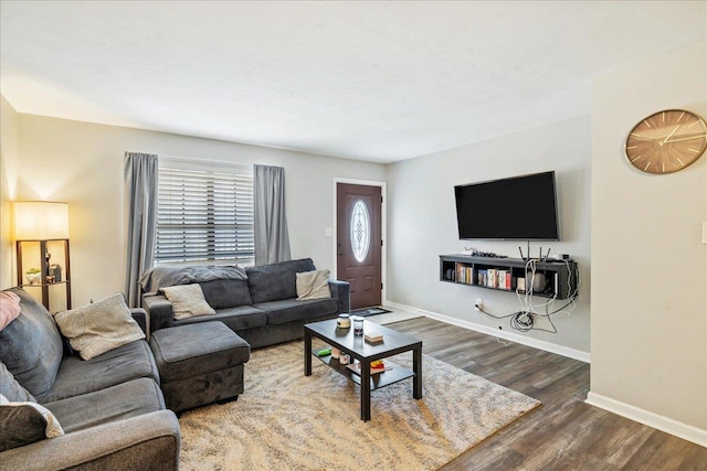 living room with dark hardwood / wood-style floors