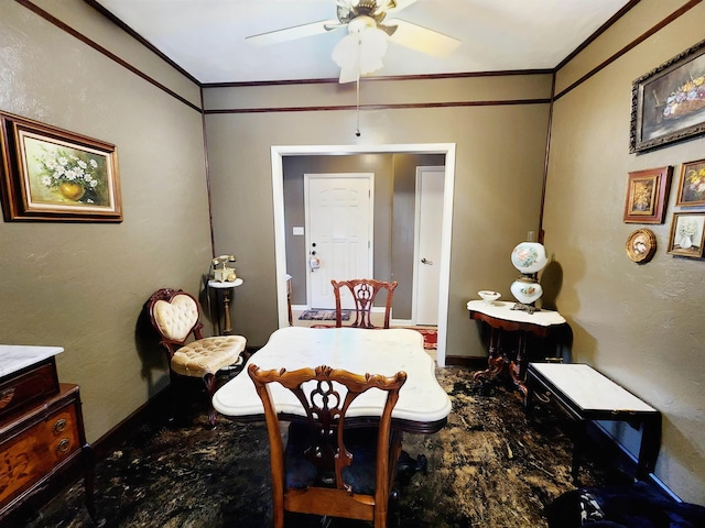 dining area with ornamental molding and ceiling fan