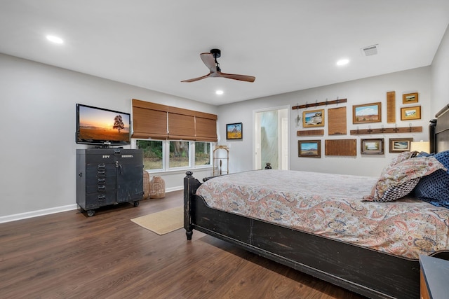 bedroom featuring dark wood-style floors, recessed lighting, visible vents, and baseboards