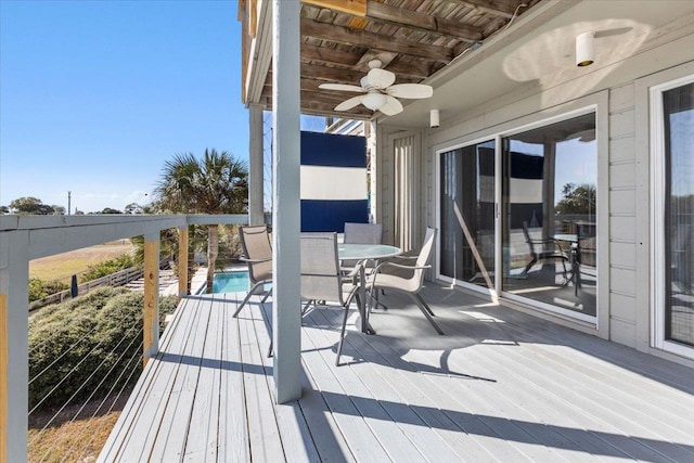 17 Harbour Point Dr, Crawfordville, FL 32327 - deck featuring a ceiling fan and outdoor dining space