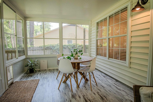 1682 Copperfield Cir, Tallahassee, FL 32312 - sunroom featuring wood finished floors and outdoor dining area
