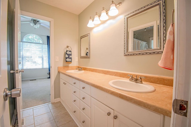 1682 Copperfield Cir, Tallahassee, FL 32312 - bathroom with double vanity, tile patterned floors, and a ceiling fan