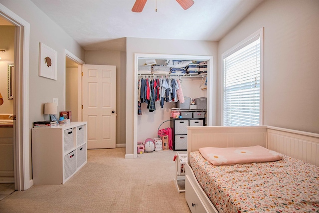 1682 Copperfield Cir, Tallahassee, FL 32312 - bedroom with light carpet, a ceiling fan, and a closet