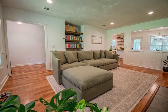 1682 Copperfield Cir, Tallahassee, FL 32312 - living area with light wood-style flooring, recessed lighting, and built in shelves