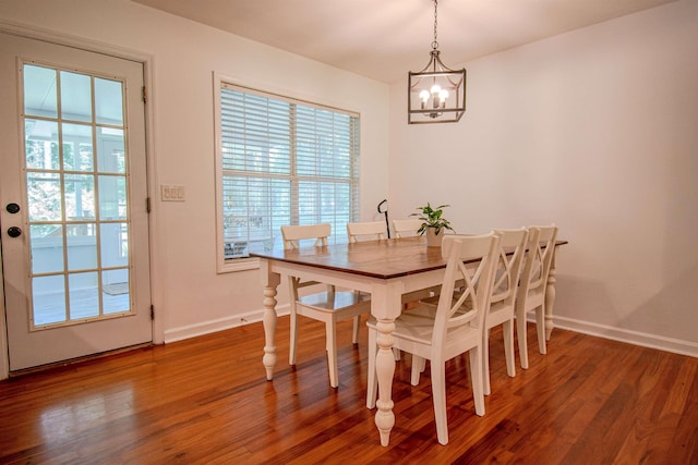 1682 Copperfield Cir, Tallahassee, FL 32312 - dining area featuring a chandelier and wood finished floors