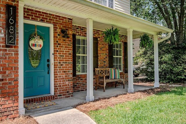 1682 Copperfield Cir, Tallahassee, FL 32312 - entrance to property featuring covered porch and brick siding