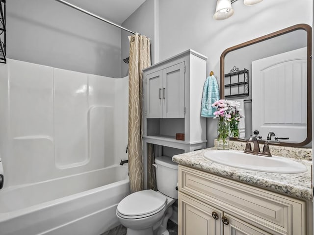 full bath featuring shower / tub combo, vanity, and toilet