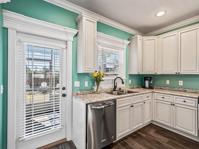 kitchen featuring light stone counters, dark wood finished floors, white cabinetry, a sink, and dishwasher