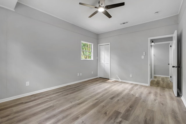 2212 Berkshire Dr, Tallahassee, FL 32304 - unfurnished bedroom with a closet, visible vents, light wood-type flooring, and baseboards