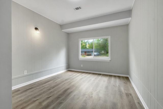2212 Berkshire Dr, Tallahassee, FL 32304 - empty room featuring visible vents and wood finished floors