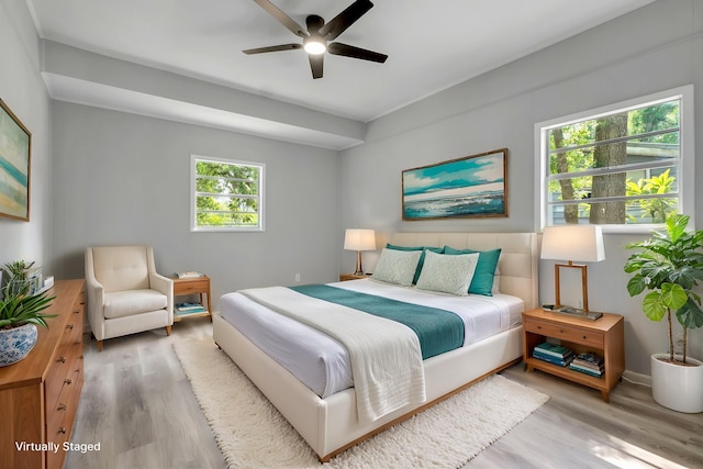 2212 Berkshire Dr, Tallahassee, FL 32304 - bedroom featuring a ceiling fan and wood finished floors