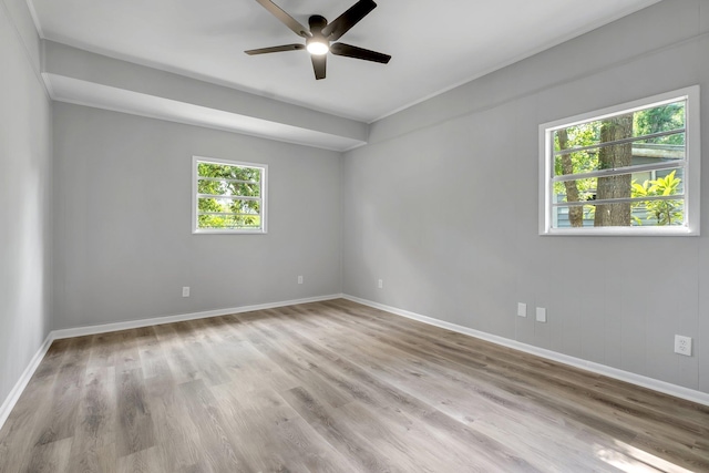 2212 Berkshire Dr, Tallahassee, FL 32304 - unfurnished room with baseboards, a ceiling fan, and wood finished floors