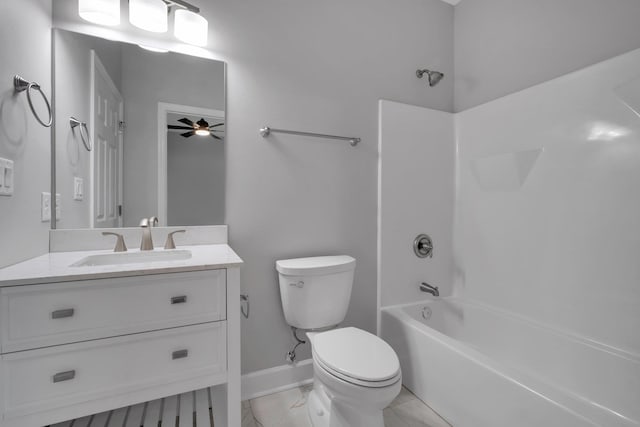 full bathroom with ceiling fan, vanity, bathtub / shower combination, and toilet