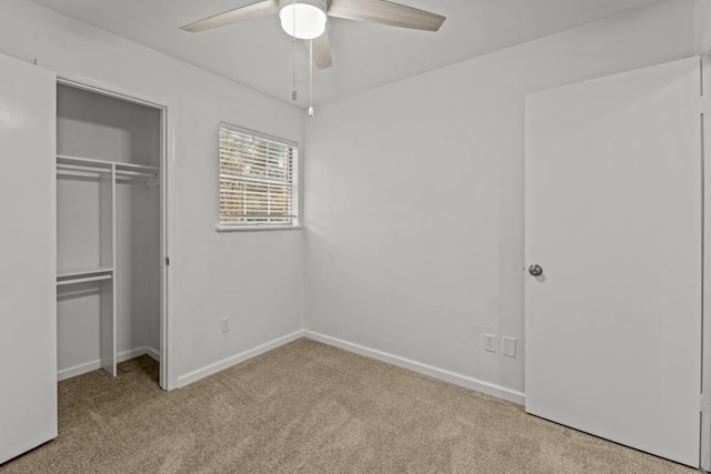 3142 Seattle Slew Ct, Tallahassee, FL 32309 - unfurnished bedroom with carpet flooring, a closet, baseboards, and a ceiling fan