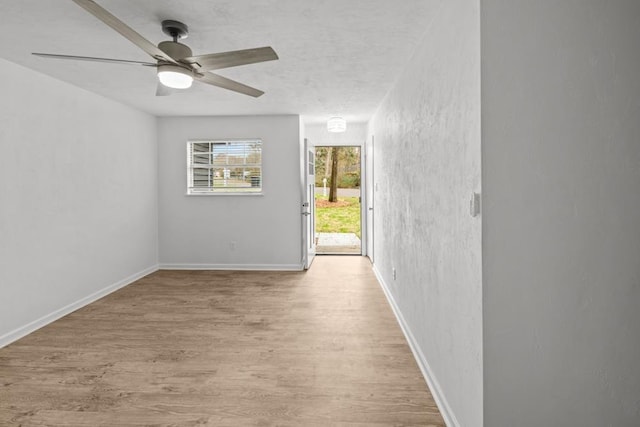 3142 Seattle Slew Ct, Tallahassee, FL 32309 - spare room featuring light wood-style flooring, ceiling fan, and baseboards