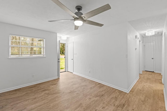 3142 Seattle Slew Ct, Tallahassee, FL 32309 - spare room featuring light wood-style flooring, a ceiling fan, and baseboards