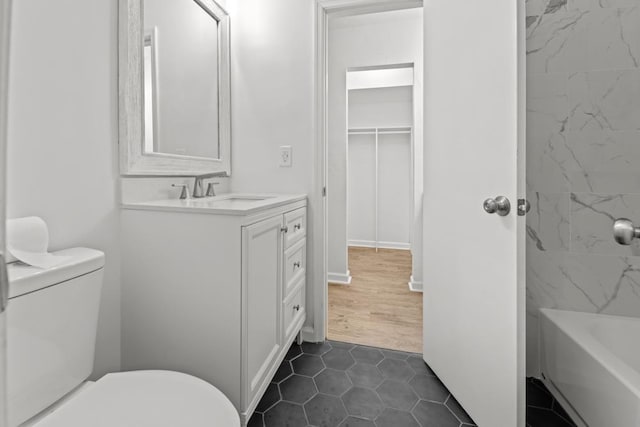 3142 Seattle Slew Ct, Tallahassee, FL 32309 - bathroom featuring toilet, vanity, and tile patterned floors